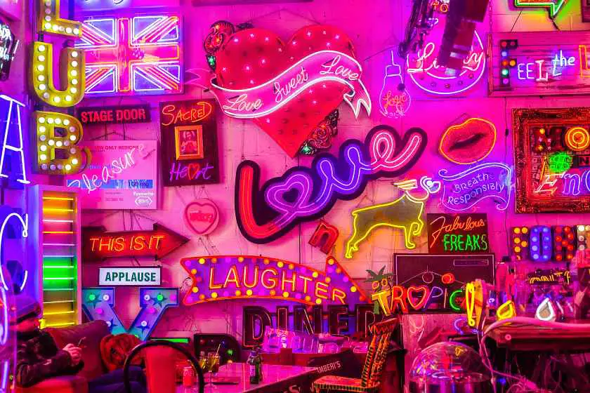 Many neon signs at God's Own Junkyard in London