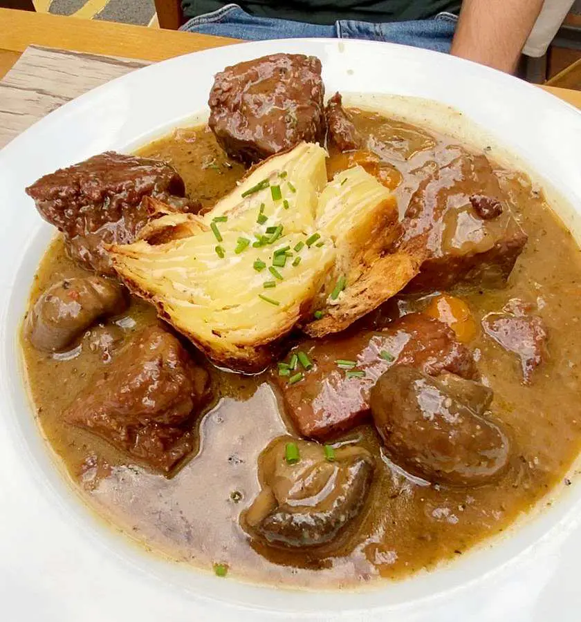 Seitan "beef" stew with mushrooms and triple cooked potato at vegan restaurant le Potager du marais 