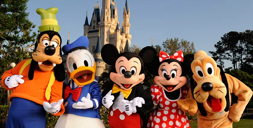 Disneyland Paris characters in front of Sleeping Beauty's Castle