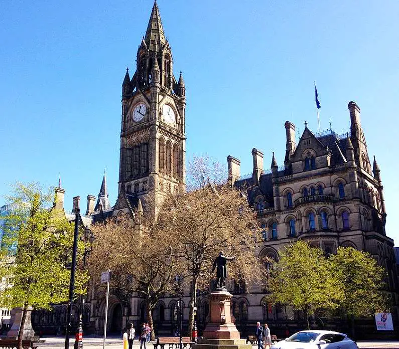 Manchester Town Hall, a gothic building with a large clock tower