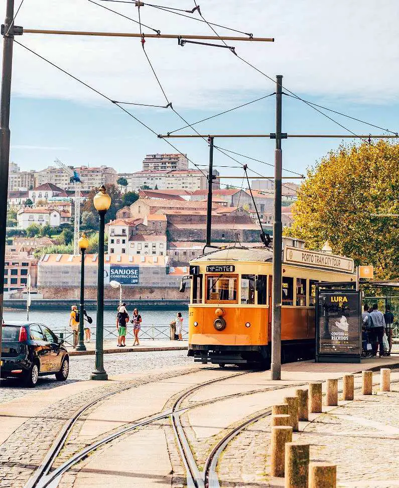 Old fashioned tram by the seafront in Porto
