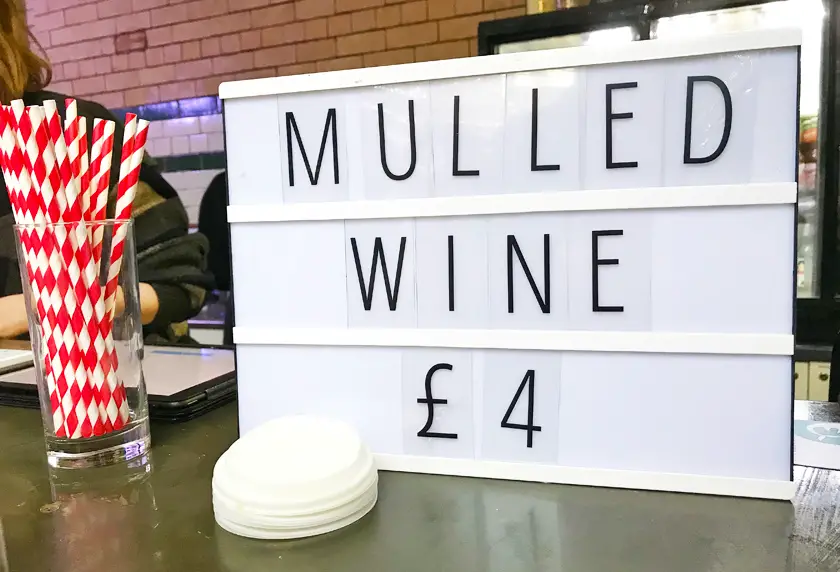 Sports Hall, vegan mulled wine stand, food hall, inside Victoria baths, guide to Manchester's vegan Christmas Festival