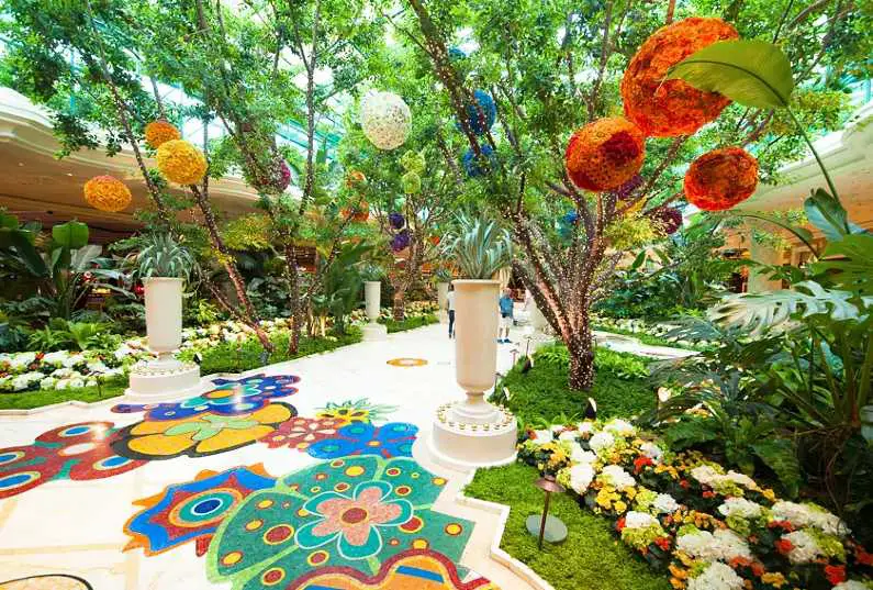 Inside the lobby area of the Wynn hotel in Las vegas with bright and flowery decor