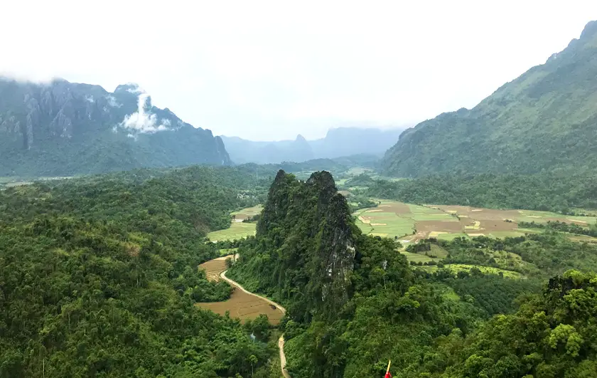 Mountains and greenery in Laos, Breaking up, backpacking and beginning again 