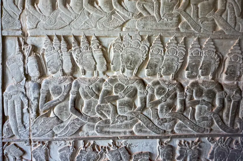 Carved wall with religious figures. 