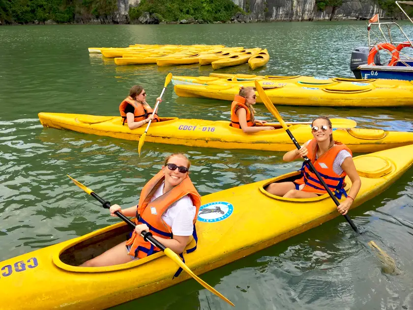 Mel from Footsteps on the Globe kayaking in Halong Bay in Vietnam