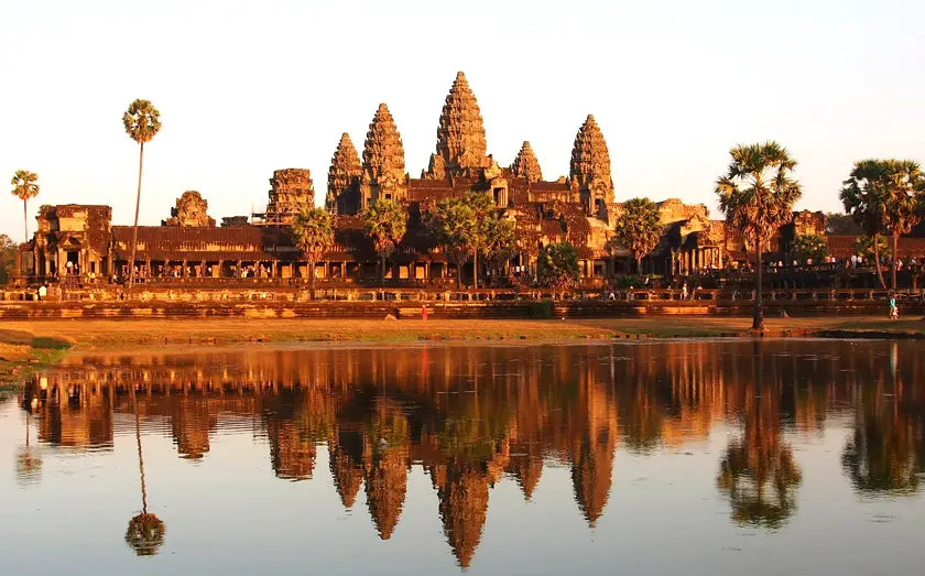 The front of Angkor Wat reflected in the water.