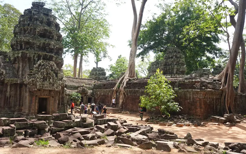 Outer temple with trees and ruins.