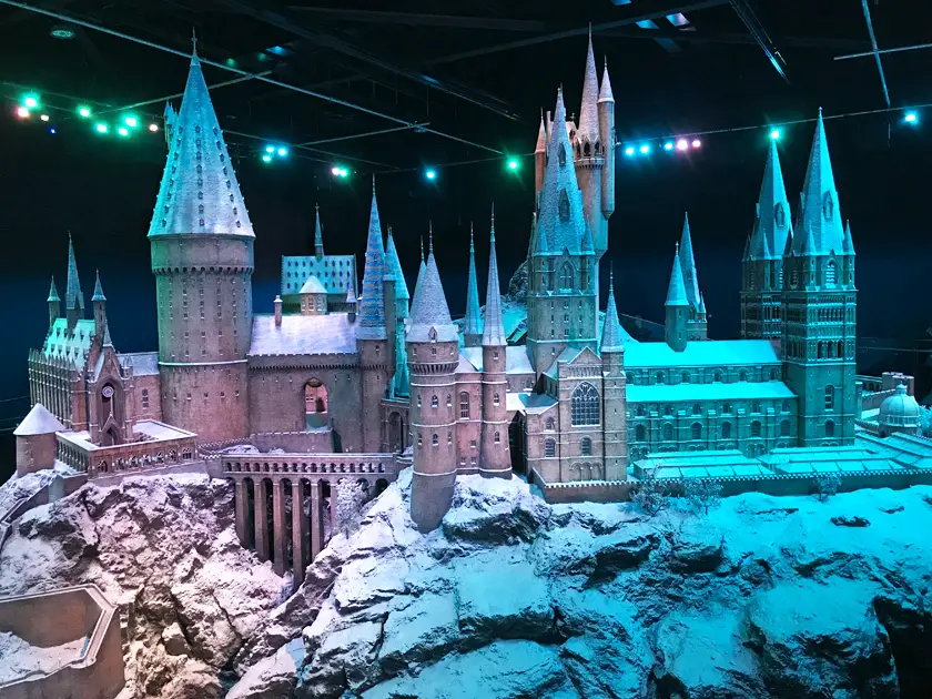 Hogwarts castle model with snow all over it