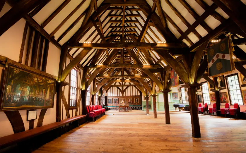 Inside the Merchant Adventurers' Hall in York with medieval wooden beams and wood flooring