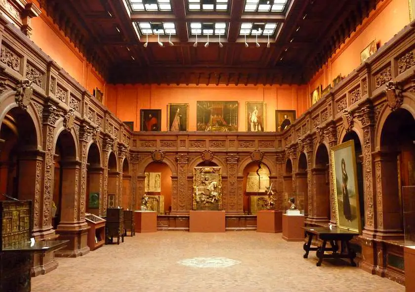 Paintings and wood work arches in the Hispanic Society of American in New York