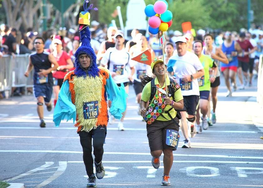Two runners as Kevin and Russell from Disney-Pixar "Up" during the Disney Marathon