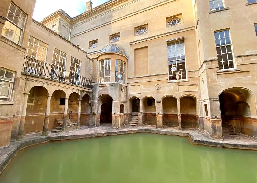 Bubbling pool inside the Roman Baths in Bath 