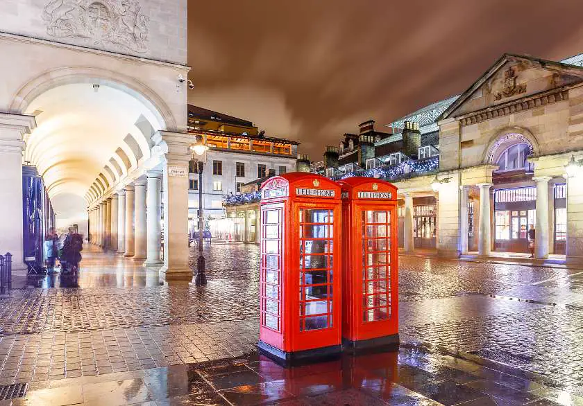 Covent garden London with red phone boxes