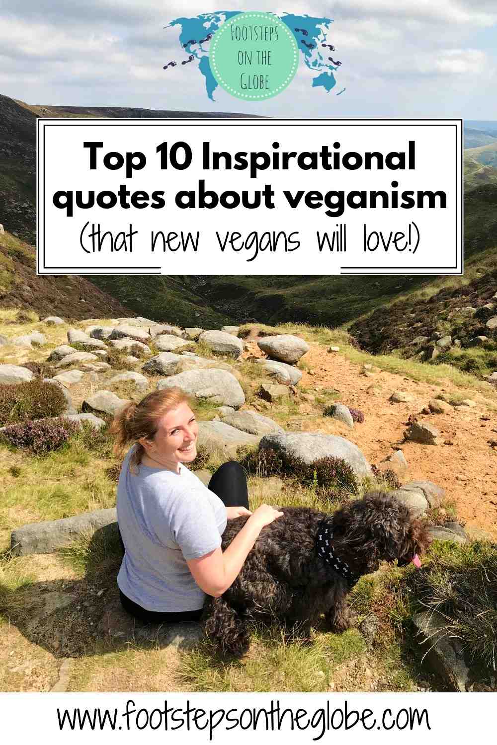 Girl and her grey dog sitting on a grassy hill overlooking hills in the UK