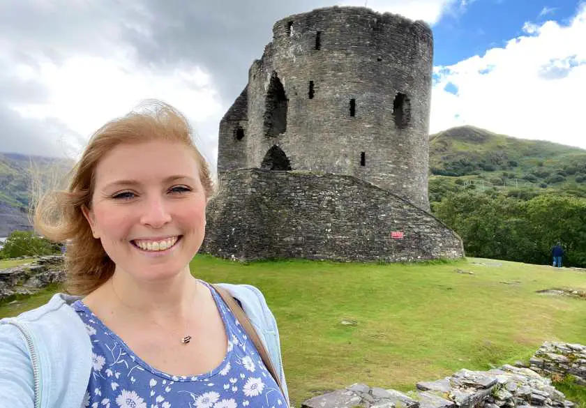 Mel taking a selfie in front of Dolbadarn Castle, 13th century ruins based in Llanberis