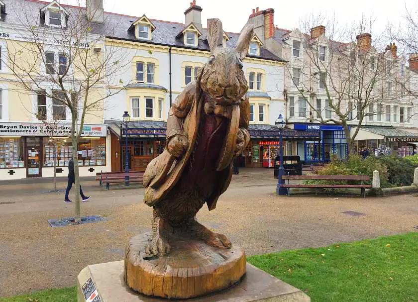 Wooden statue of the rabbit from Alice and Wonderland in Llandudno town centre