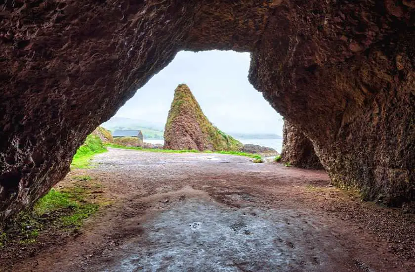 Entrance to Cushendun Cave from inside the cave which is one of the Game of Thrones locations in Northern Ireland