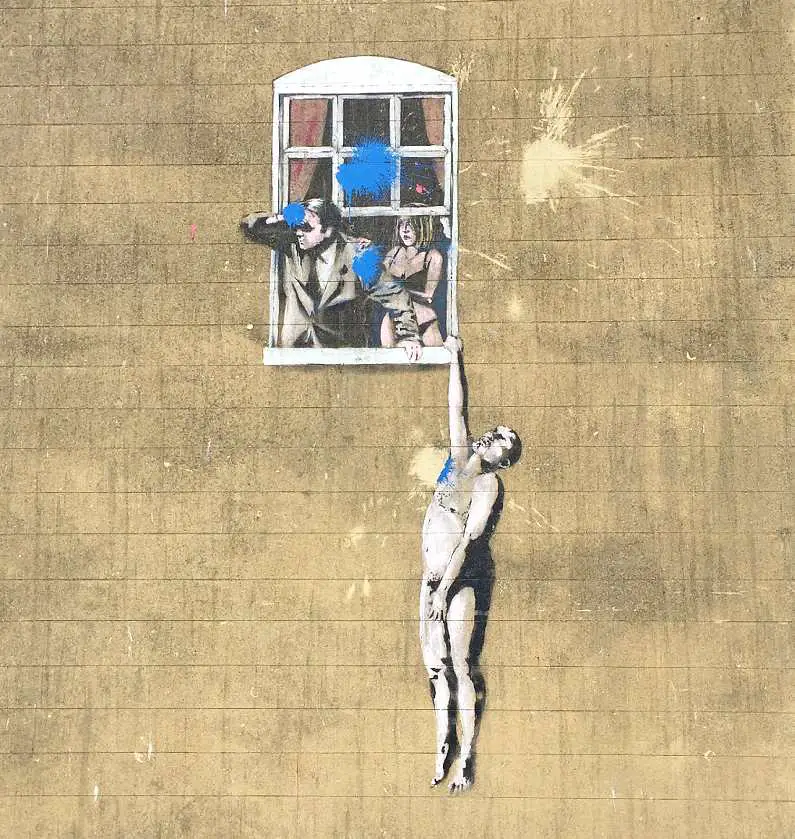Banksy's, "Well Hung Lover" mural in Bristol