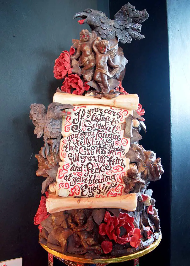 Crow and bloody scroll Halloween cake at Choccywoccydoodah