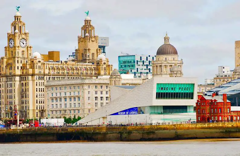 Museum of Liverpool by the waterfront with the Liver building behind it