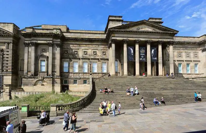 Front of the World Museum in Liverpool, a neo-classic style building with grand columns and a large staircase