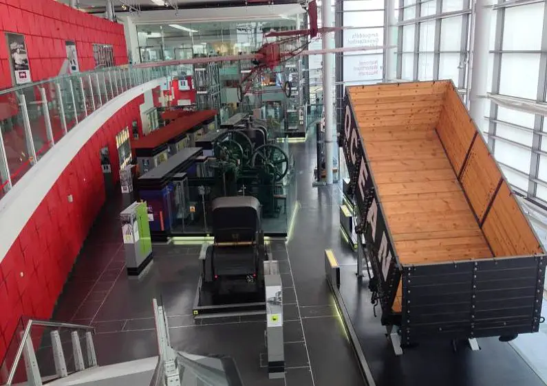 Inside the National Waterfront Museum with industrial turn of the century machinery in the foyer 