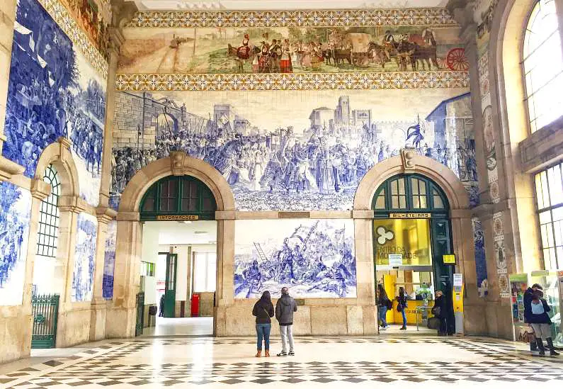 Detailed blue and white historic tiles on the São Bento Railway Station in Porto