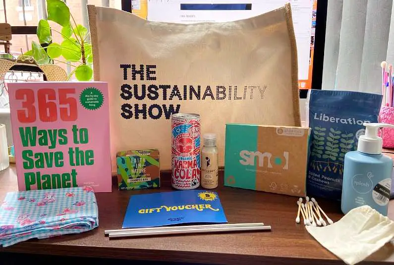 The Sustainability Show goodie bag with various eco-products, snacks, a "Save the Planet" book and leaflets with discounts