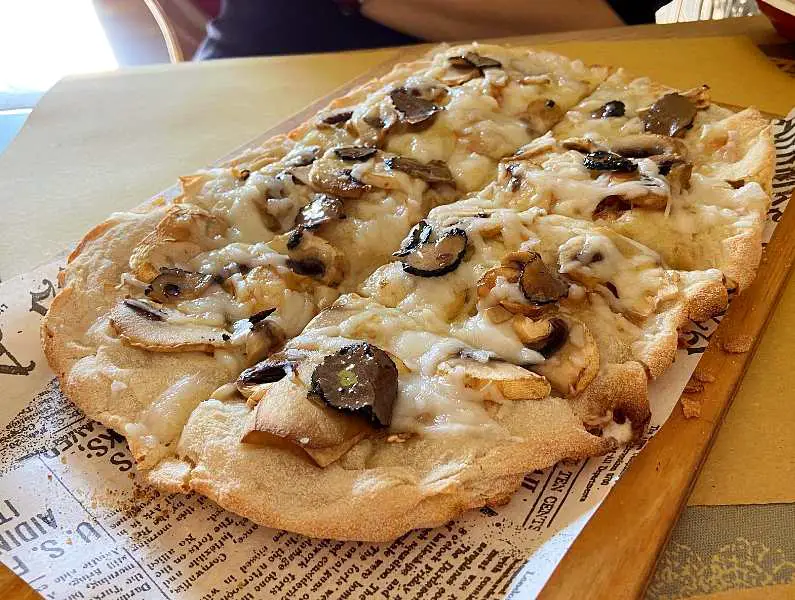 Square mushroom and vegan cheese pizza