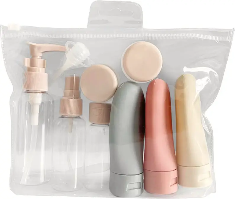 Clear plastic cosmetics bag with refillable bottles and containers 