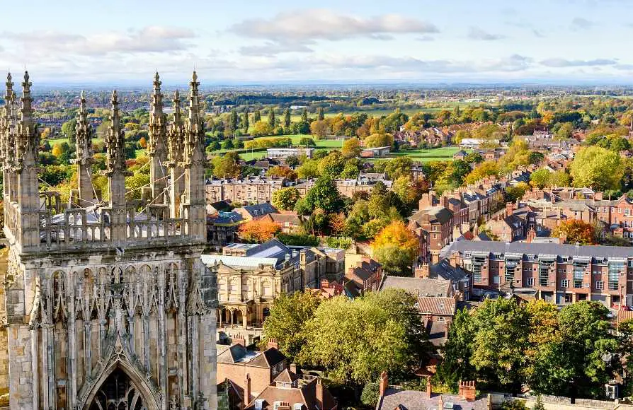 View of York from above the Cathedral with trees and rows of old buildings
