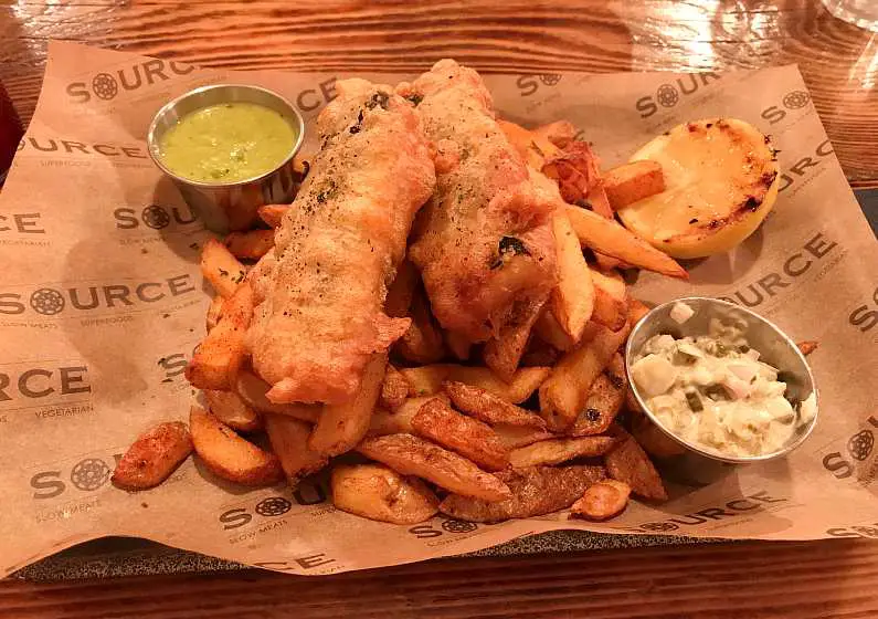 Vegan fish and chips with mushy peas in a pot